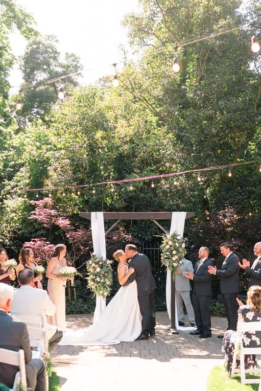 Romantic golden hour wedding portrait at rustic Northern California venue