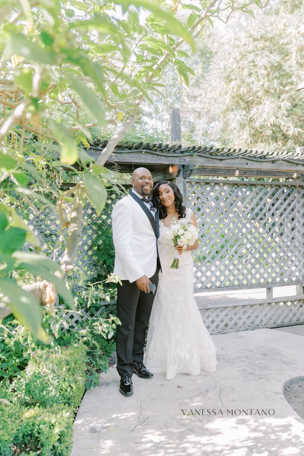 Wedding couple after first look by Vanessa Montano at Brownstone Gardens Venue