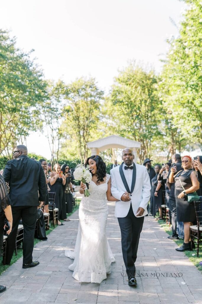 Bride and Groom walking down the isle after saying i do.