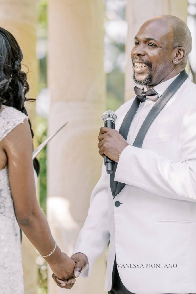 Groom smiling during Vows in Oakley Ca Wedding